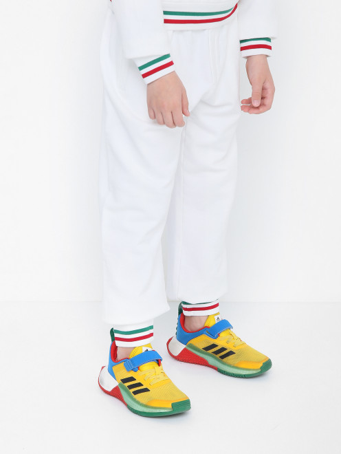 Трикотажные брюки с принтом и карманами Dolce & Gabbana - МодельВерхНиз